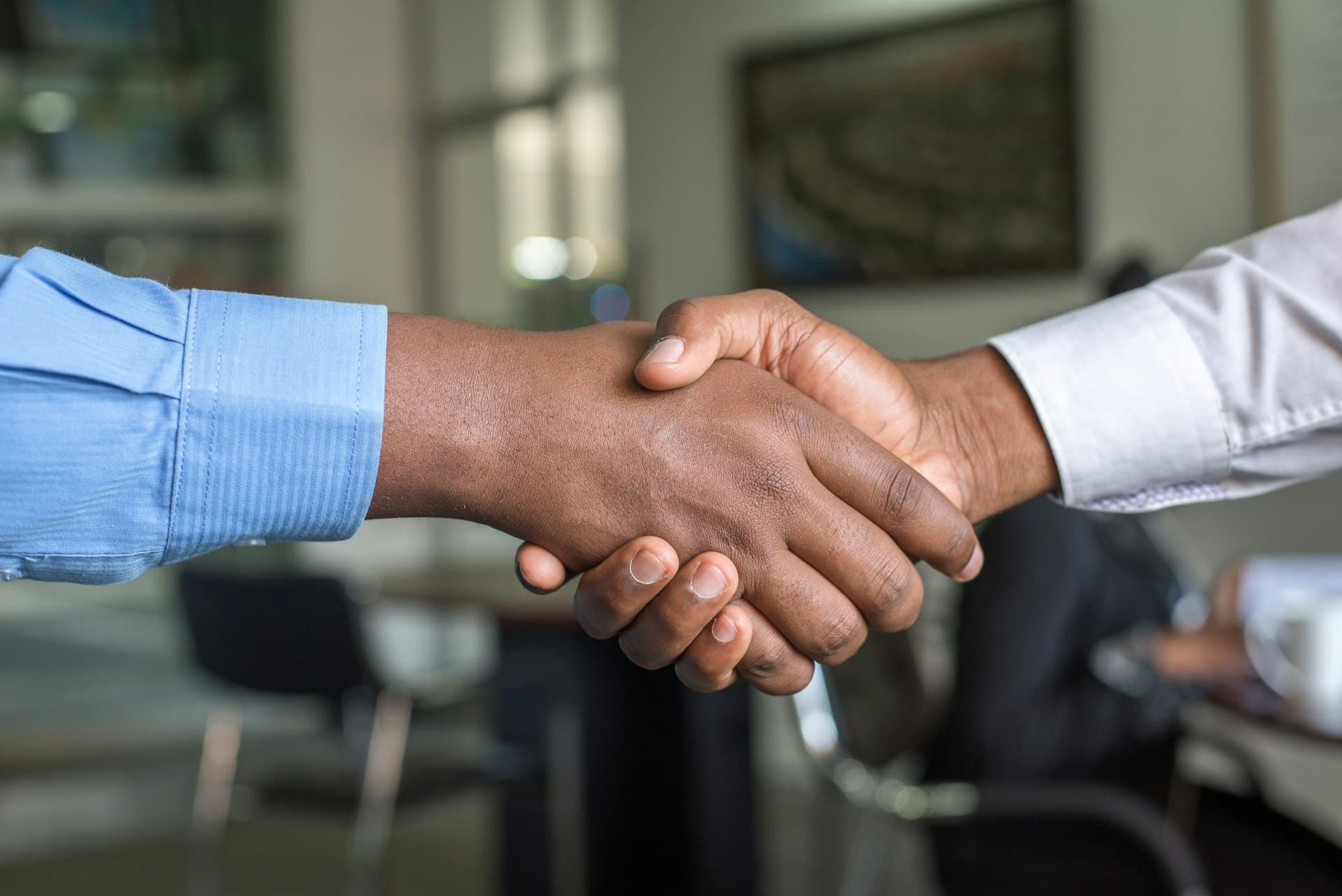 Business handshake meeting